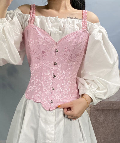 Top corset rose avec structure florale Top corset rose avec structure florale